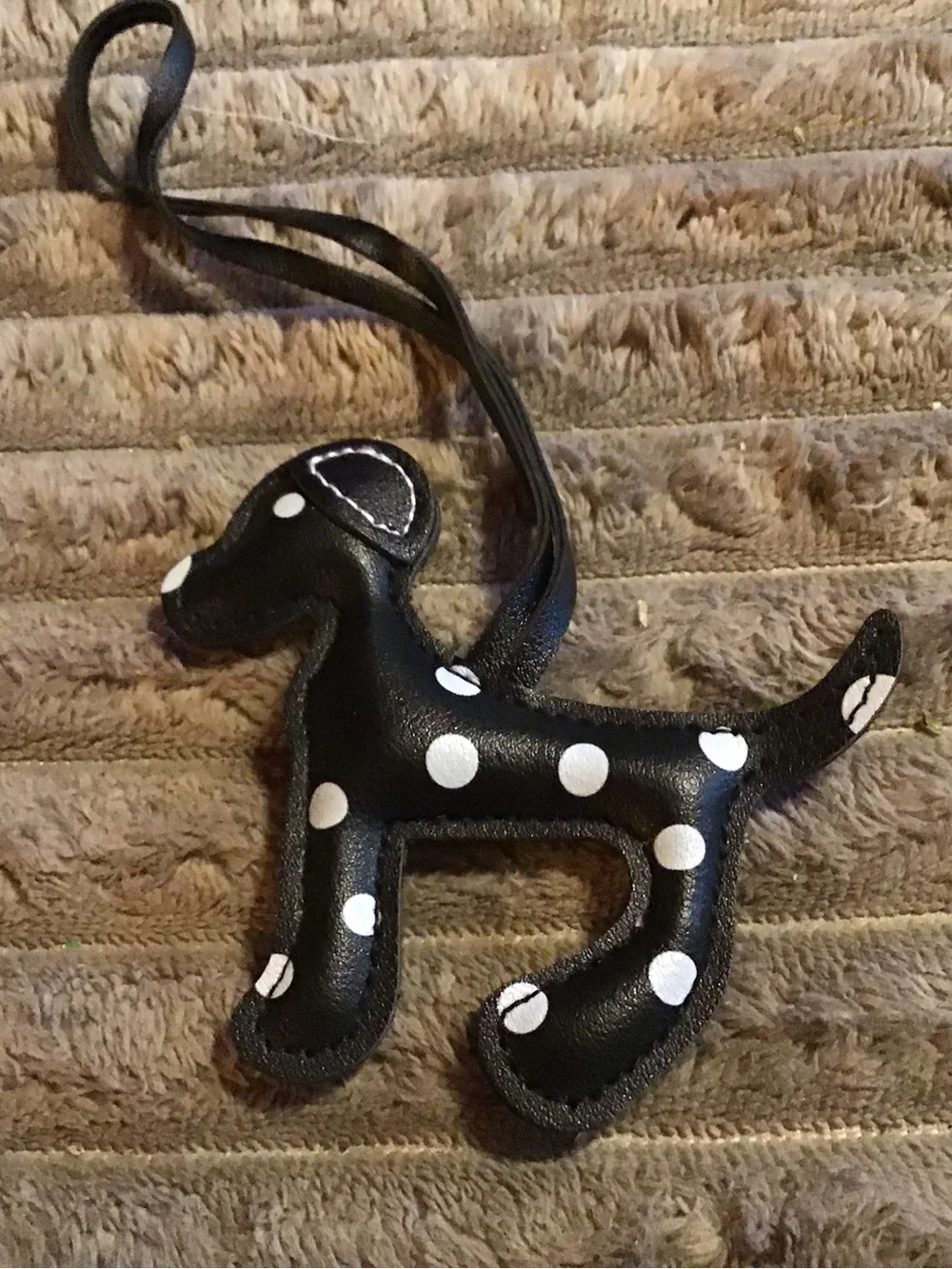 Black and white polka dot leather dog charm